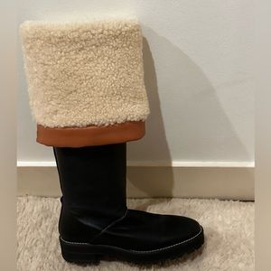 Stuart Weitzman leather boots with shearling